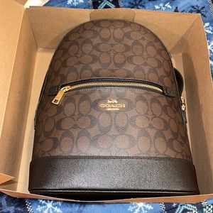 Signature Coach brown/black leather backpack
